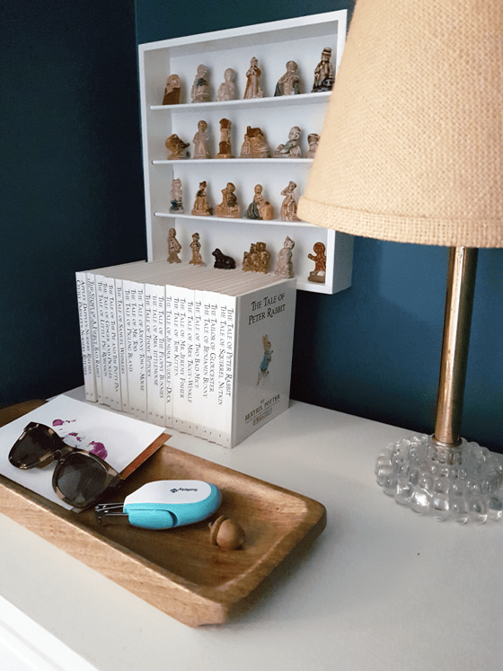 Wood tray on a white dresser