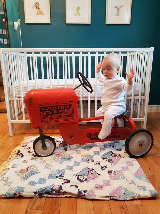 Ellie sitting on her tractor