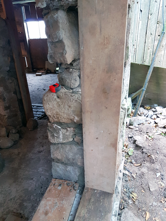 Repairing a stone barn foundation
