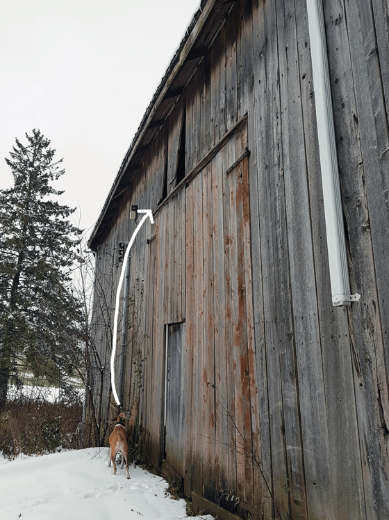 Patching wood siding on a barn