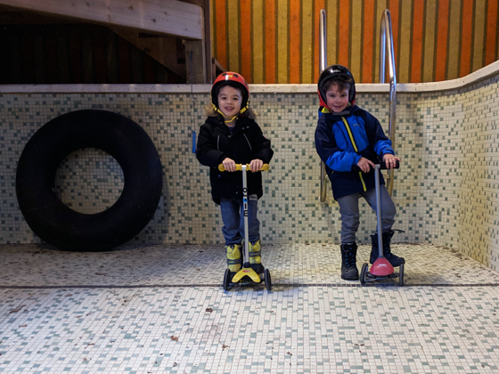 Riding scooters in the indoor pool