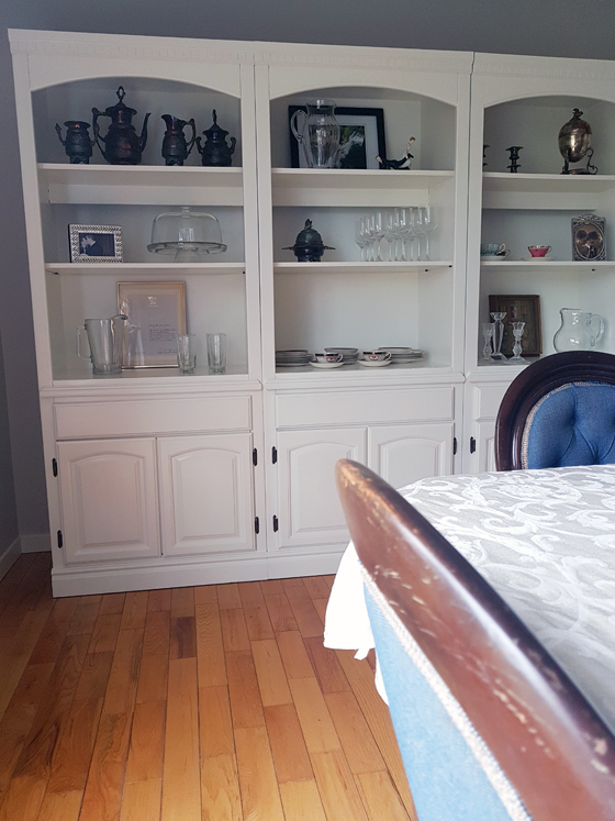 Vintage shelving unit used as a china cabinet
