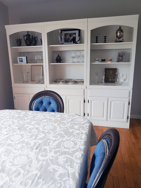 White china cabinet in the dining room