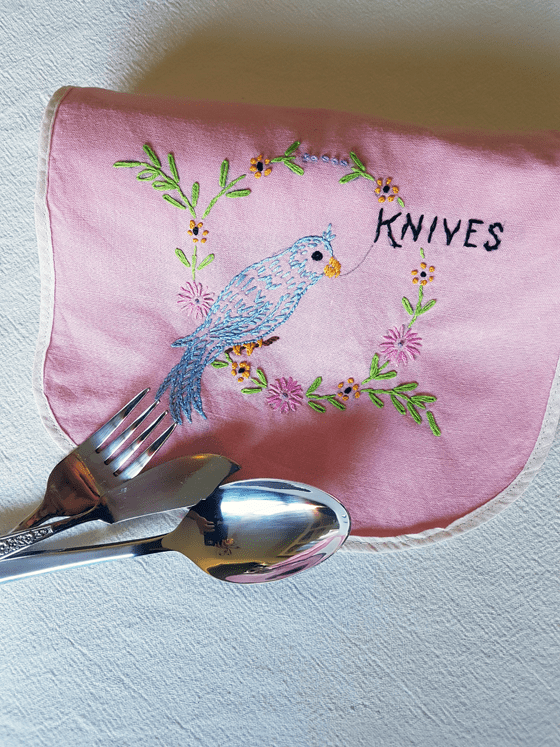 Embroidered fabric cutlery holder