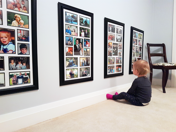Ellie looking at photos of Daddy