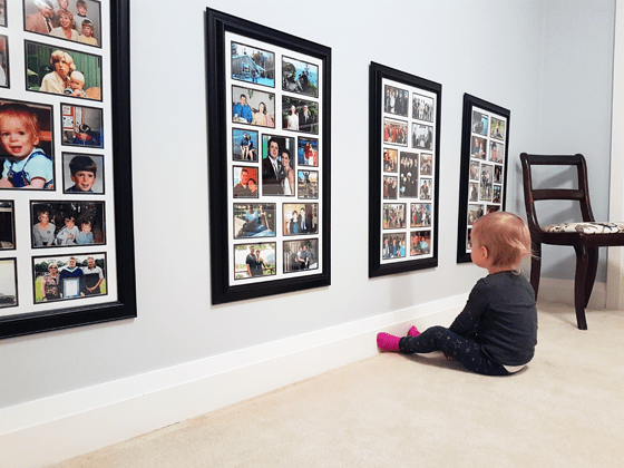 Ellie looking at photos of Daddy