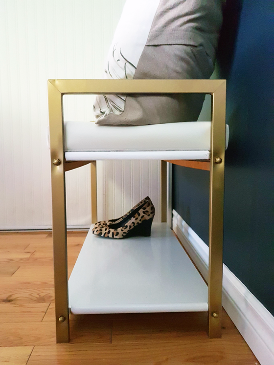 Brass and white bench