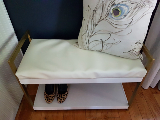 Brass and white bench