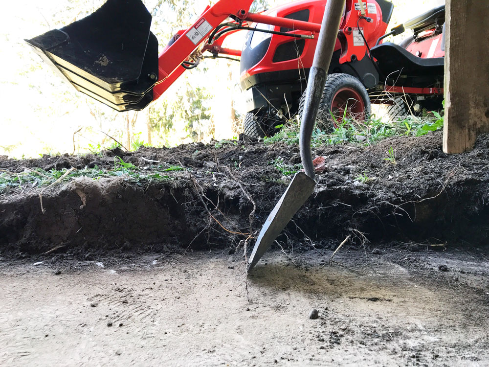Shovel in front of dirt